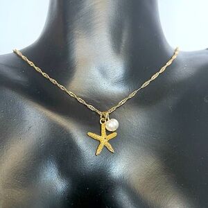 Stainless steel sea star faux pearl gold tone necklace